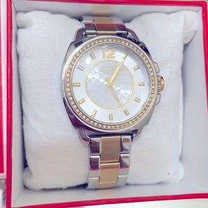 Women’s two-tone Coach watch with crystals